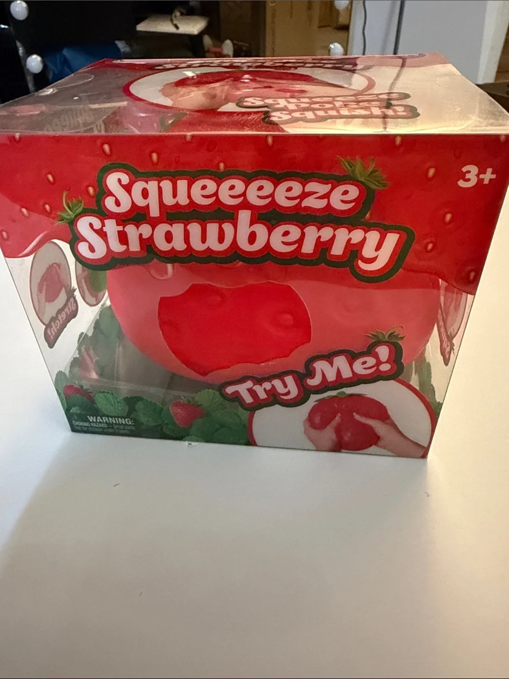 Squeeze Strawberry Squeeze Toy - Red with Green Leaf